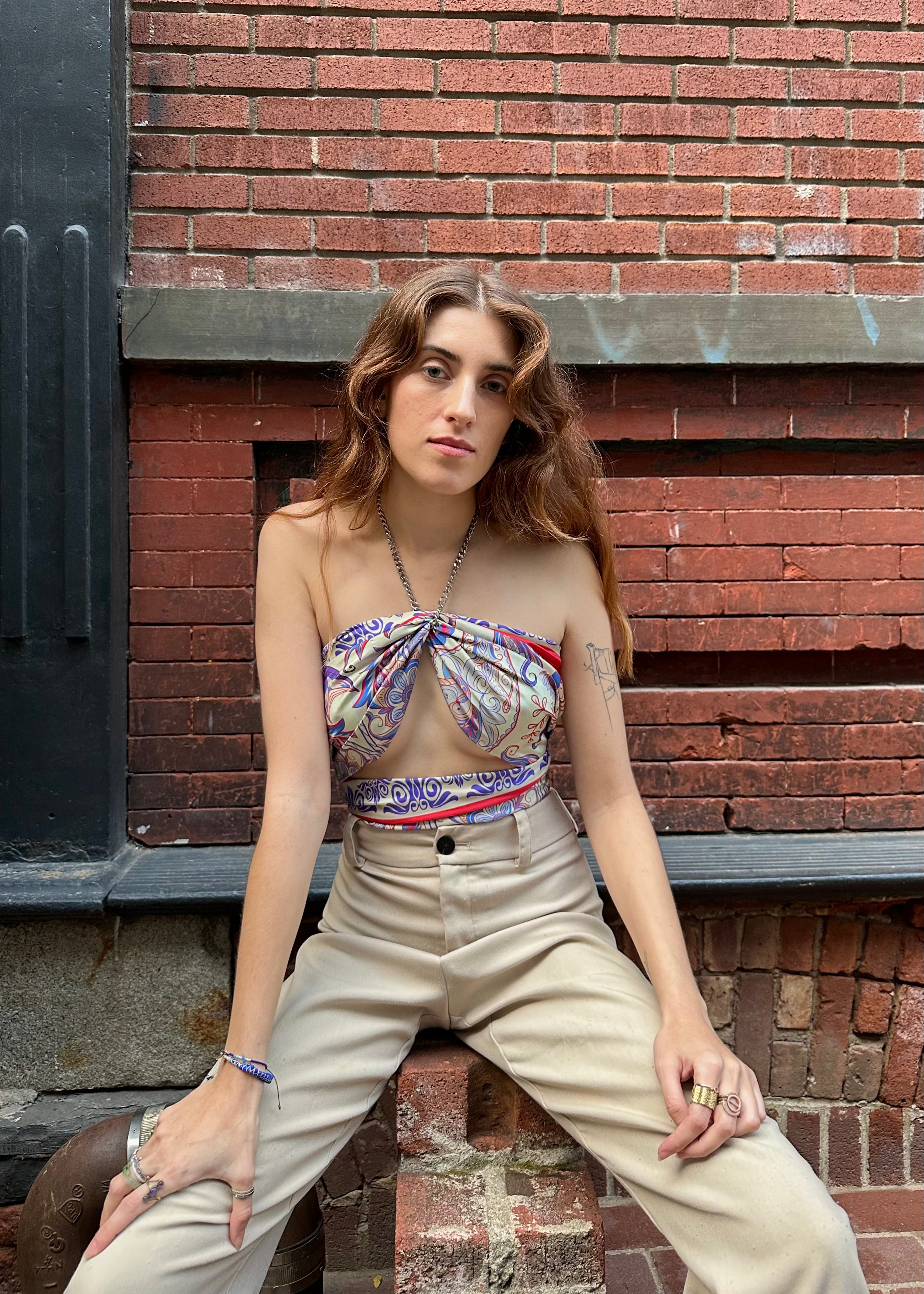 Styling the Rubino red and blue silk scarf as a top with a silver chain in New York City — a cool, confident summer look with bold NYC edge.